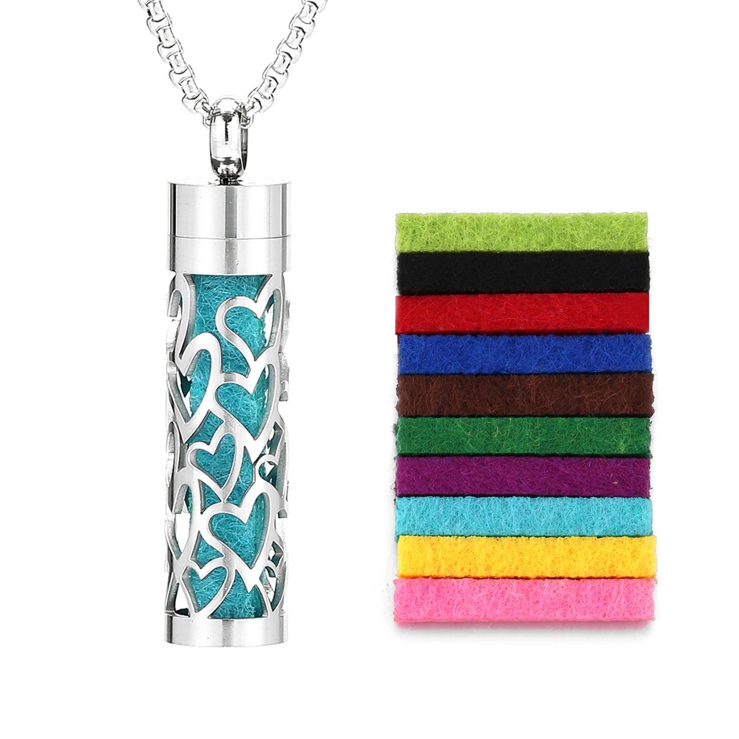 Silver necklace with a turquoise heart-patterned pendant next to colorful felt strips on a white background

